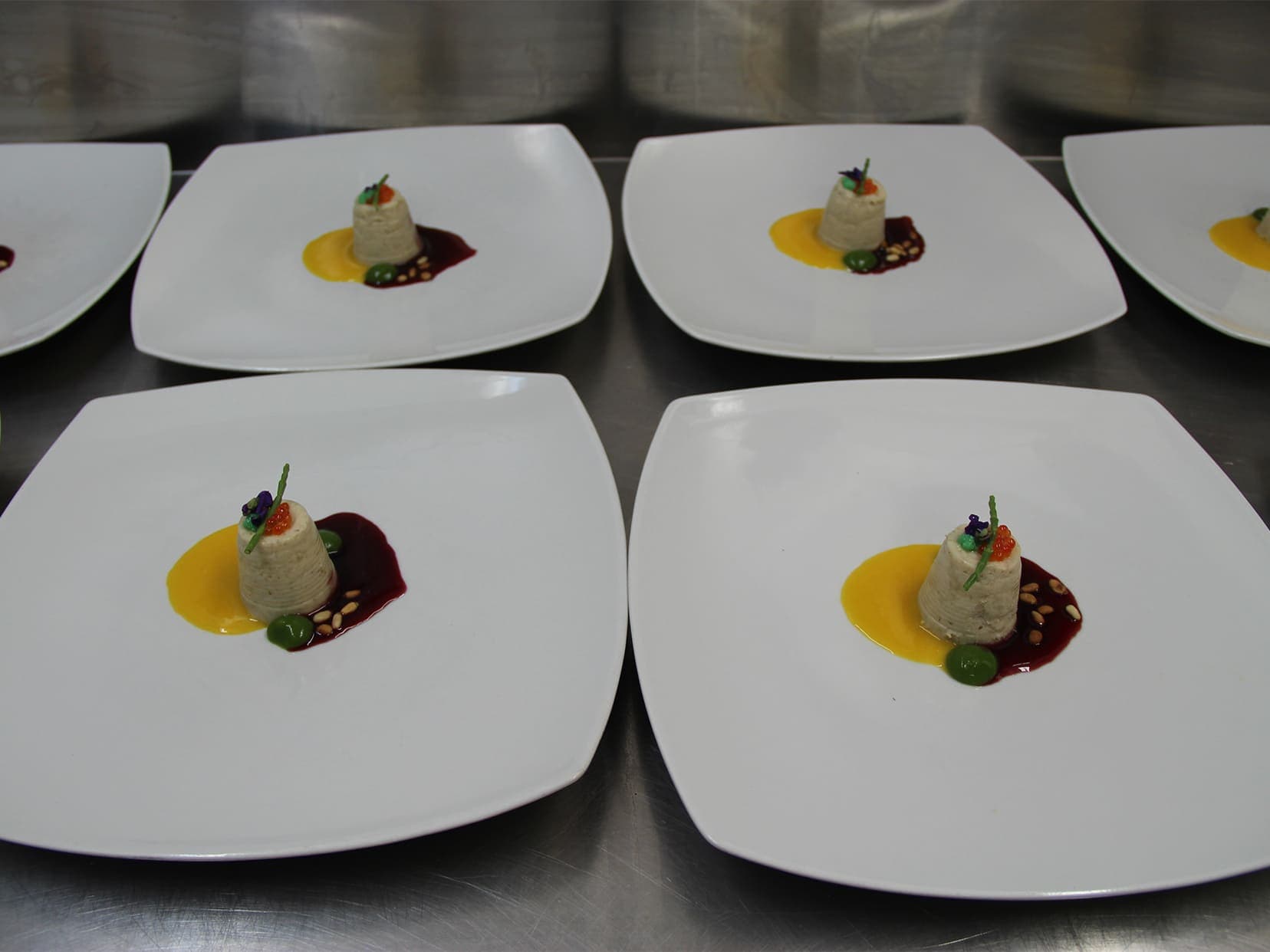 Conte restaurant meals on white plates
